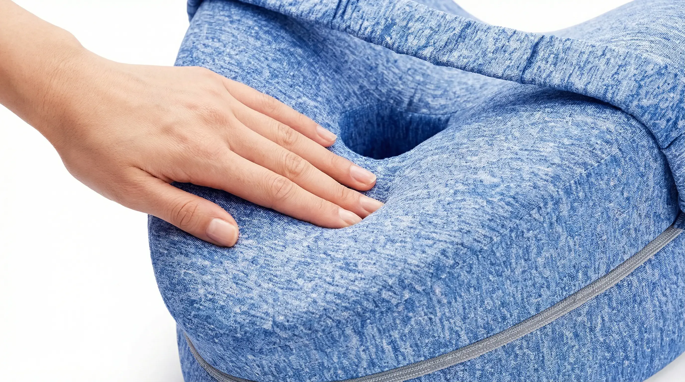 Close view of the blue memory-foam pillow and contoured knee channel