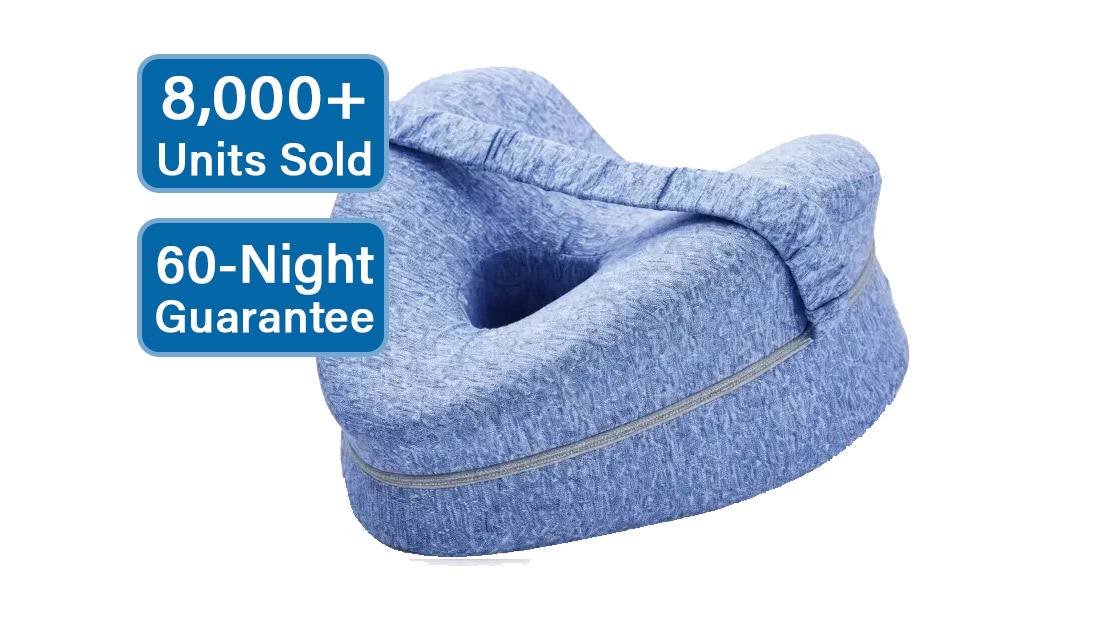The blue contoured Sciatica Pillow with elastic alignment strap